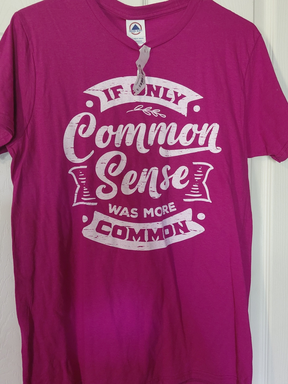 Delta Women's Bright Magenta Short Sleeve Tee with White "Common Sense" Graphic